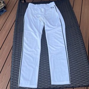 White small mens baseball pants. Very small stain on front leg